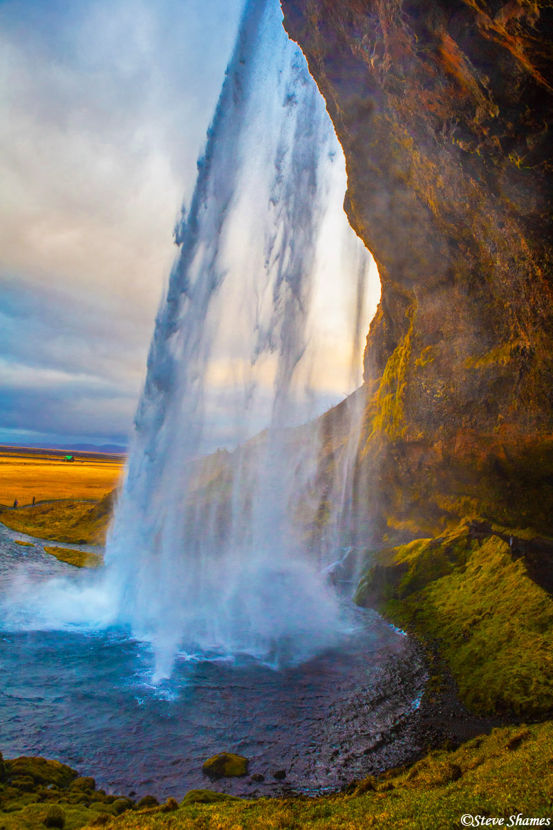Seljalandsfoss waterfall.  You can walk behind it, but bring your raincoat.