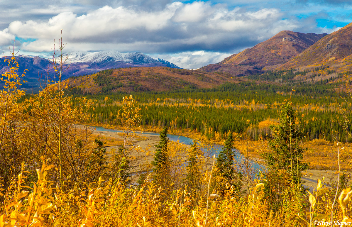 A very pleasant scene in Alaska. All the elements are here - river, forest, mountains, clouds. This was along the George Parks...