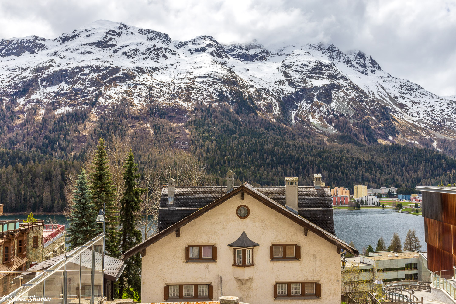 The town of St. Mortitz is a beautiful town. The old style buildings, and the lake, and the snow covered mountains rising straight...