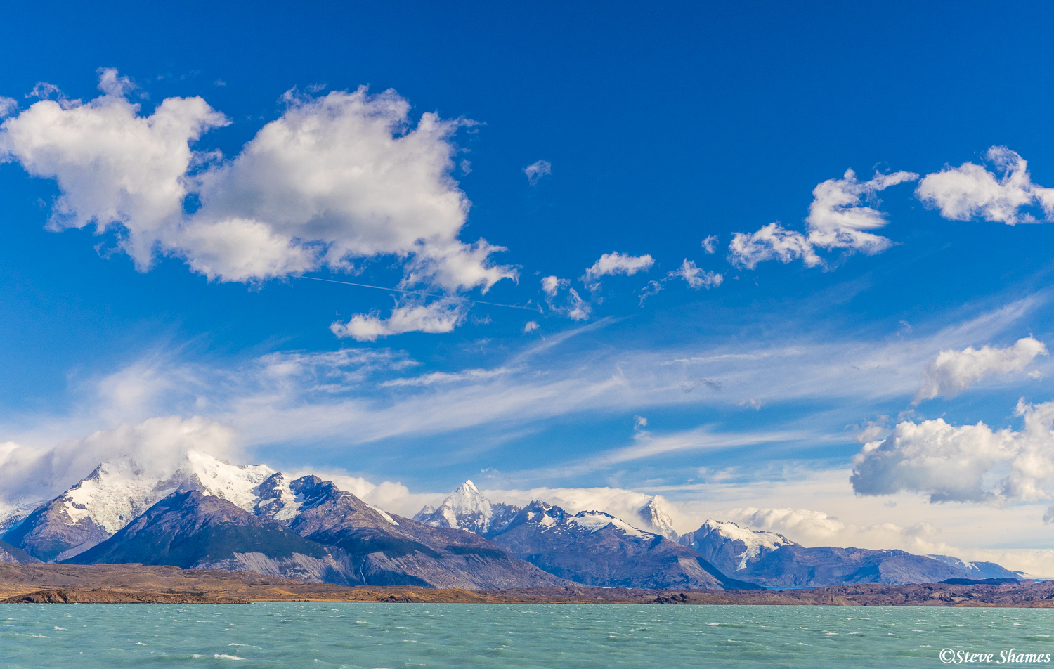 Beautiful skies and mountains make for a nice scene on Lago Argentino.
