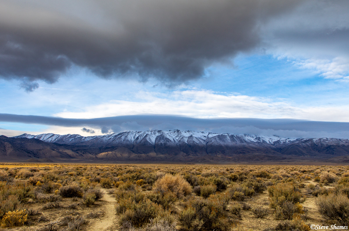 I like the way there were several layers of different looking clouds on this morning. This is the Granite Range in Northern Nevada...