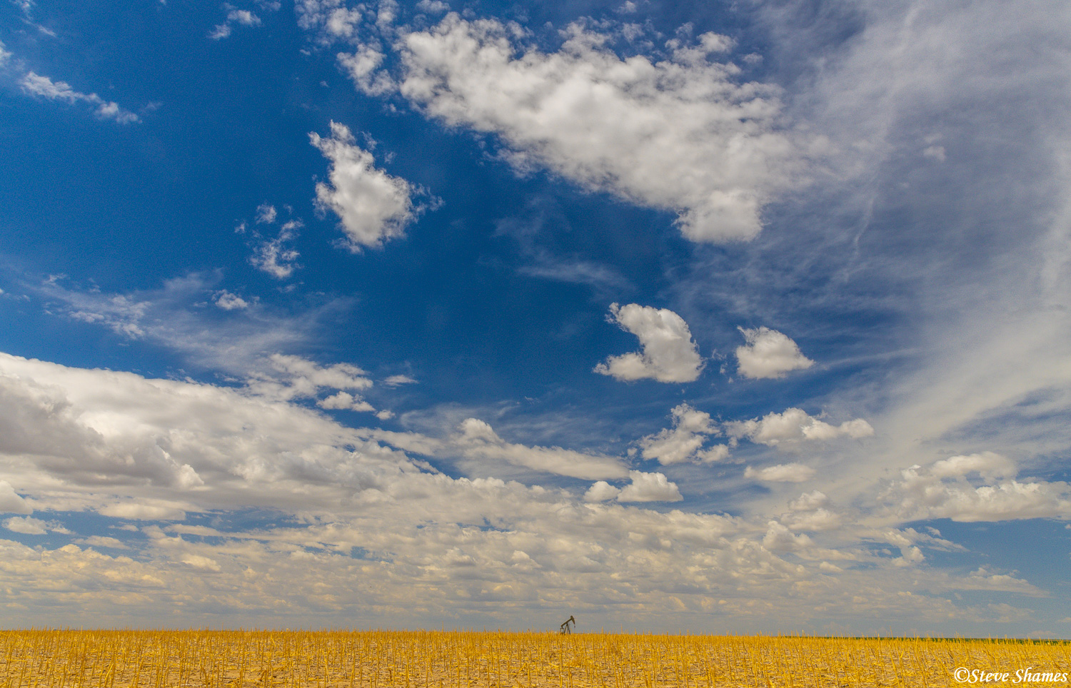 Whenever there is a great sky like this, I will be on the lookout for something to place in front of it. This lone oil rig was...