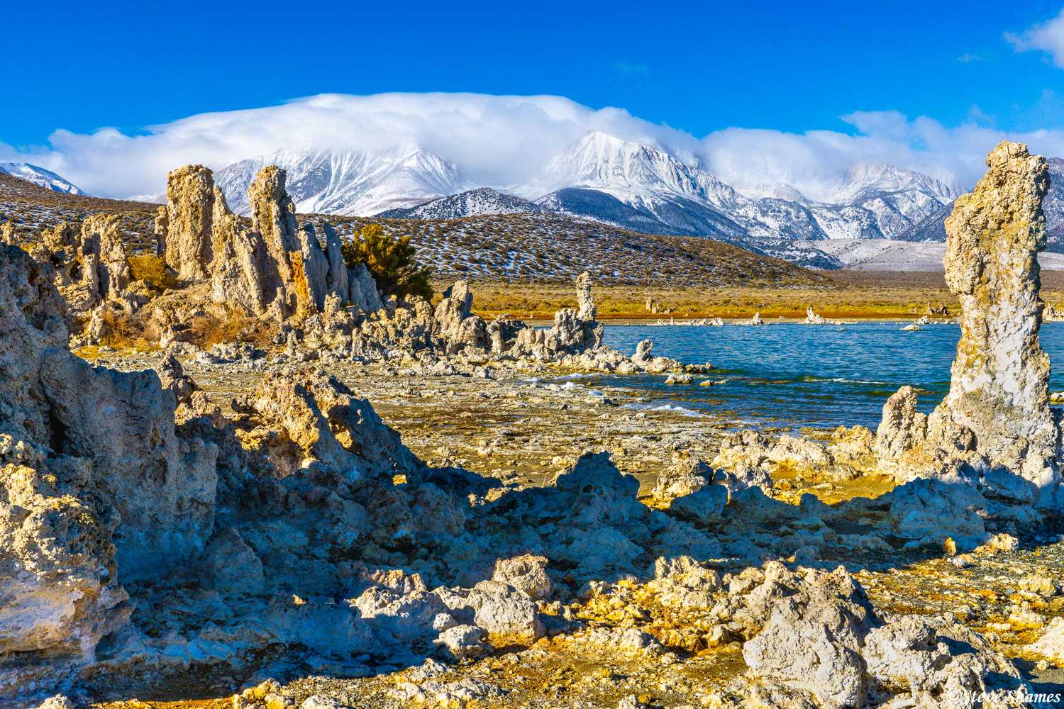 The snow and cloud covered mountains really added to this scene at Mono lake.