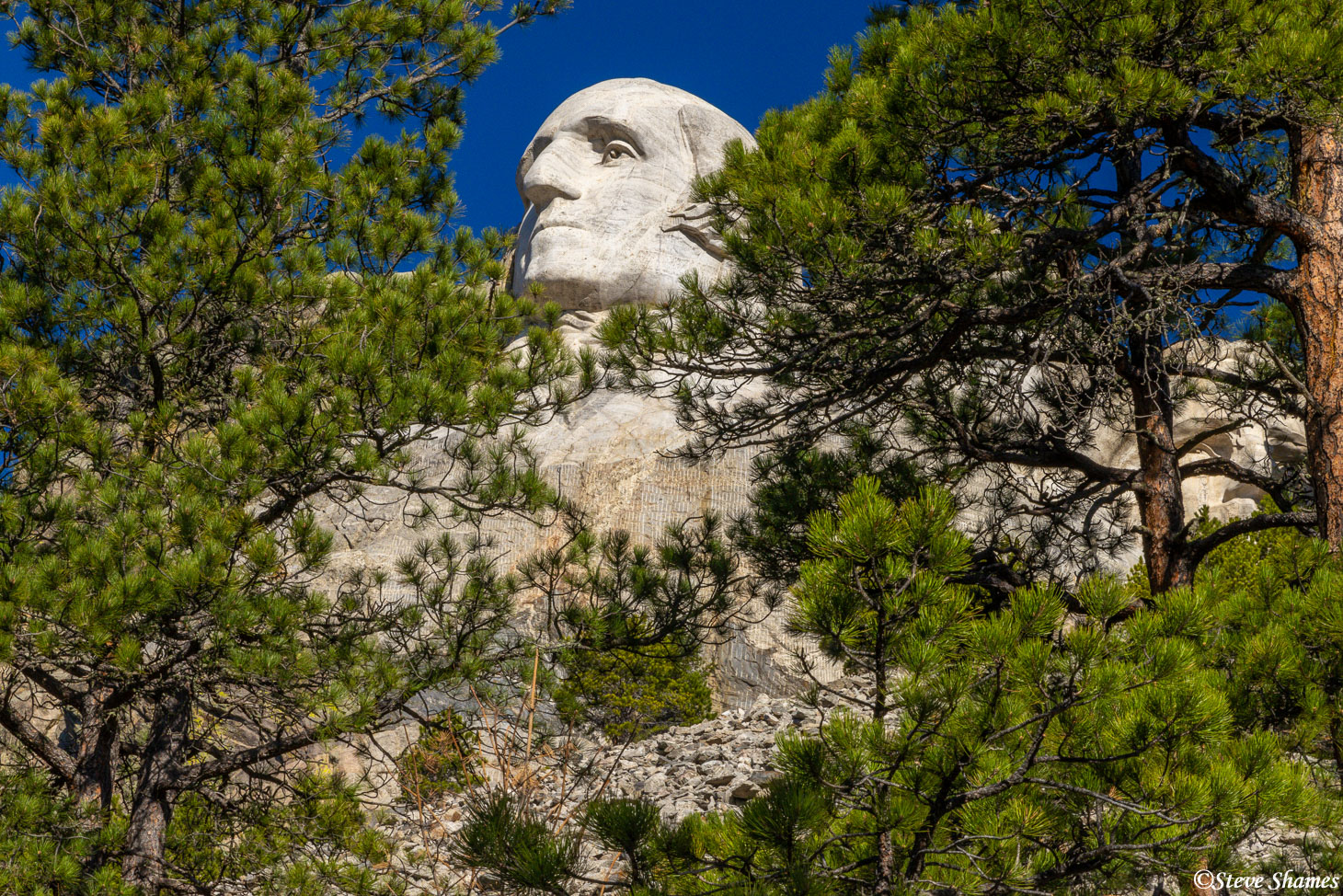 So many billions of pictures have been taken of Mt. Rushmore, so I looked to find the unique angles. Here is Washington through...