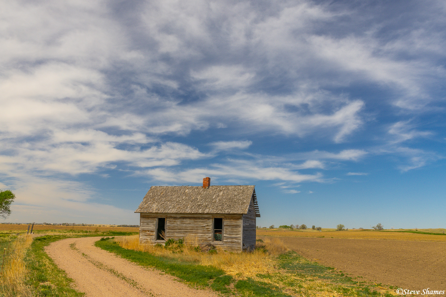 Somewhere around by Sidney Nebraska -- the old building and the great sky, I thought was worth a shot.