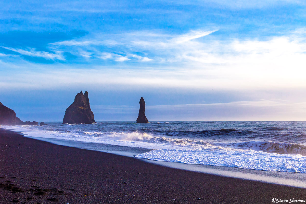 Reynisfjara, a black sand beach. This reminds me of the black sand beaches of Hawaii. Iceland and Hawaii are similar in that...