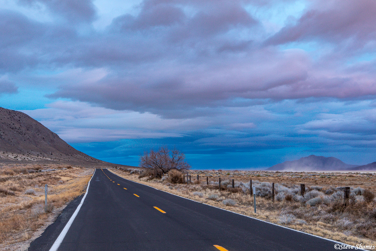 A lonely road leading into the sunset.