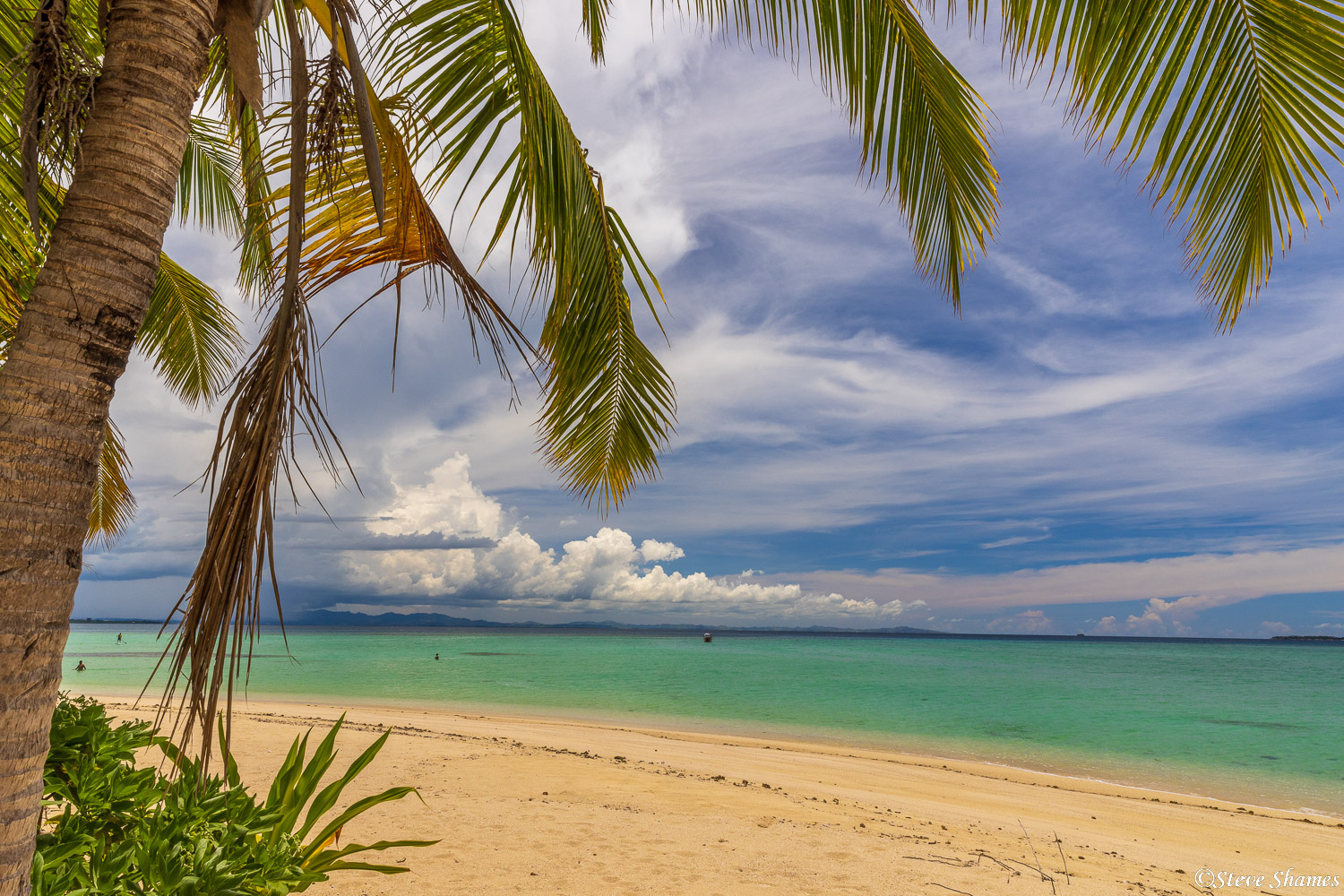 Beautiful turquoise waters surround the little Fiji island of Tivua.